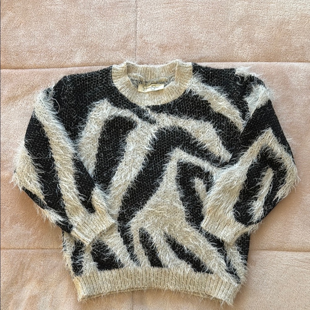 Jessica Simpson Black and Cream Sweater with Bold Zebra Print
